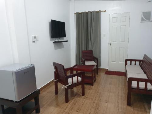 TV a/nebo společenská místnost v ubytování Pentaqua -Dineros Guest House
