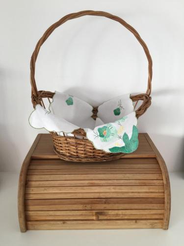 a basket sitting on top of a wooden board at Madre Deus Guest House in Lisbon