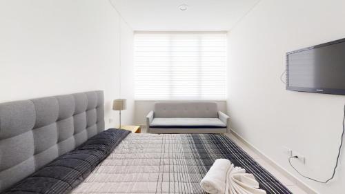 Кровать или кровати в номере Beautiful Apartment at Carso Residential with Pool