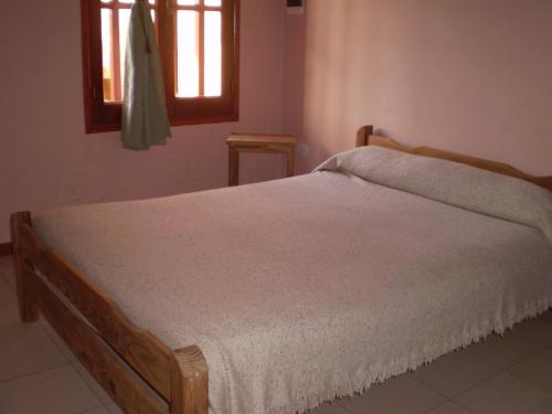 Een bed of bedden in een kamer bij Complejo Foxes 2