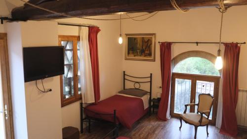 TV a/nebo společenská místnost v ubytování B&B Il Pittore