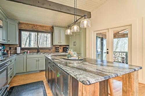 a kitchen with a large counter top in a room at Rustic-Chic Sapphire Home with Wraparound Decks in Sapphire