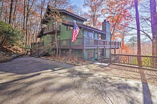 a house with a flag on the front of it at Rustic-Chic Sapphire Home with Wraparound Decks in Sapphire