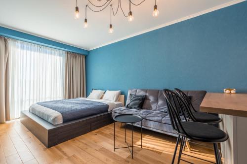 Postel nebo postele na pokoji v ubytování New Gudauri Atrium apartment #514