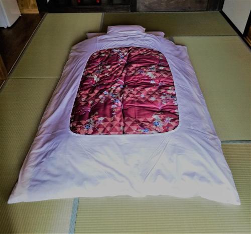 Un pat sau paturi într-o cameră la Tsukechi Bachanchi - Vacation STAY 88747v