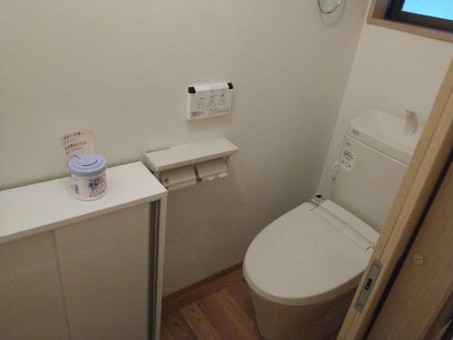 a small bathroom with a toilet and a sink at Tsukechi Bachanchi - Vacation STAY 89810v in Nakatsugawa