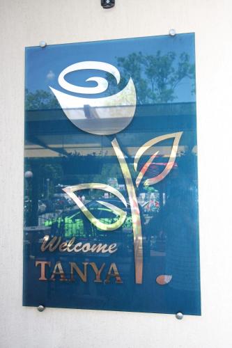 a sign that says welcome tamma on a window at Tanya Hotel in Sunny Beach