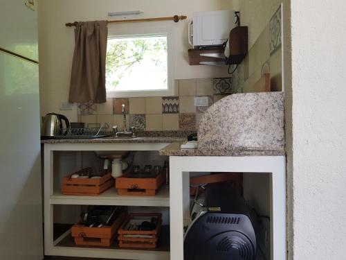 Kuchyň nebo kuchyňský kout v ubytování Cabaña La Antonia 2