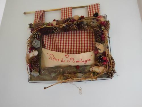 a cake that says true be a nativity at Domaine De La Carrauterie by Terre Insolite in Sautin