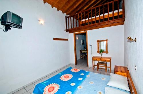 Postel nebo postele na pokoji v ubytování Athina Apartments