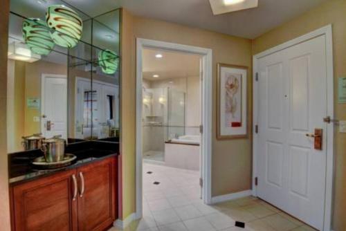 a bathroom with a sink and a bath tub at MGM Signature studio No resort fee in Las Vegas