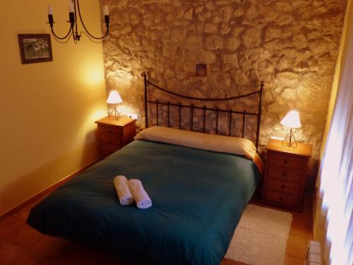 Katil atau katil-katil dalam bilik di La Caseta Del Forn (Penyagolosa)