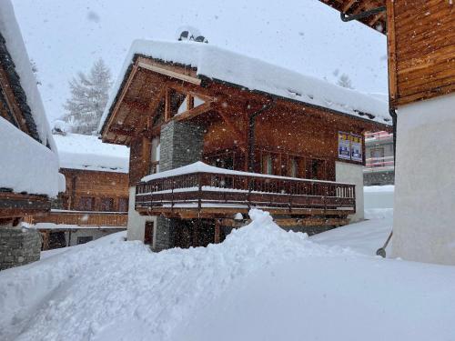 a pile of snow in front of a building at Chalet HERRISSON Peisey- Vallandry - Domaine Paradiski in Peisey-Nancroix