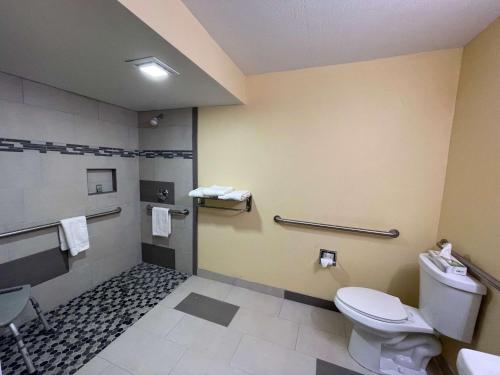 A bathroom at SureStay Plus Hotel by Best Western Odessa