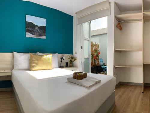 Кровать или кровати в номере Hotel Quinto Nivel
