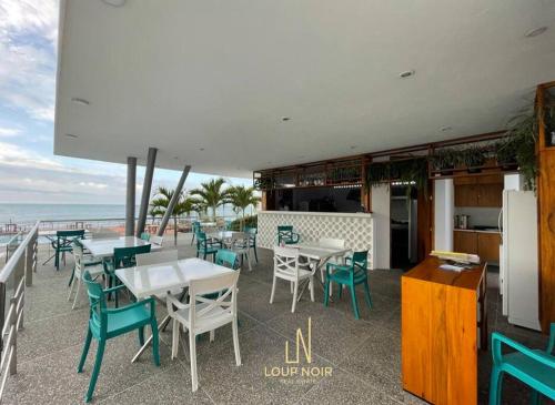Reštaurácia alebo iné gastronomické zariadenie v ubytovaní Resort Playa Azul A