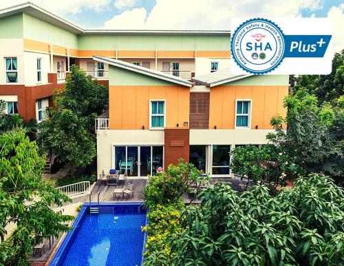 an image of a hotel with a swimming pool at U Tiny Boutique Hotel Suvarnabhumi Bangkok - SHA Plus in Lat Krabang