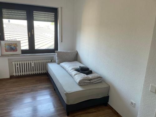 Ένα ή περισσότερα κρεβάτια σε δωμάτιο στο Apartment am Veener Kirchturm