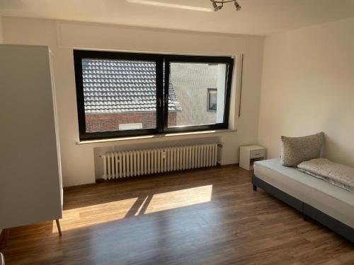 Χώρος καθιστικού στο Apartment am Veener Kirchturm