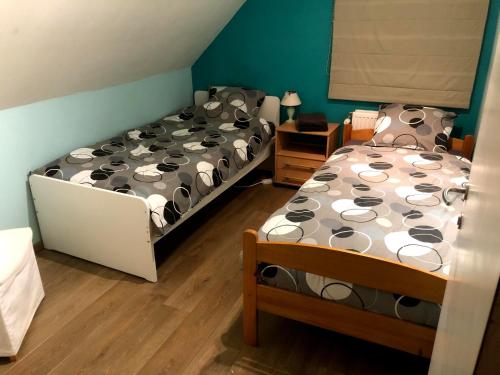 Ein Bett oder Betten in einem Zimmer der Unterkunft Julie's Place