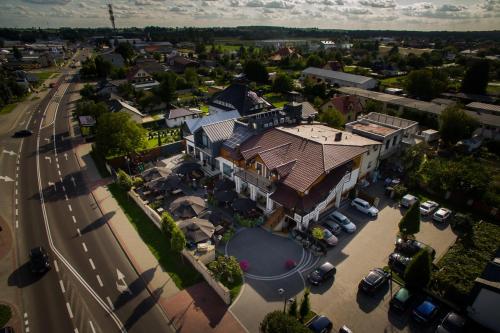 an overhead view of a town with a building at Hotel & Restauracja Gniecki in Hrubieszów