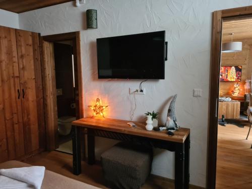 TV a/nebo společenská místnost v ubytování Chalet Alaskit Jasná