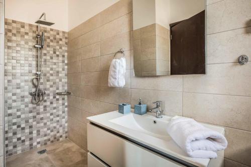 Kúpeľňa v ubytovaní Villa Theofilos