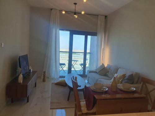 Cozy 1-bedroom apartment in Dubai South with Pool