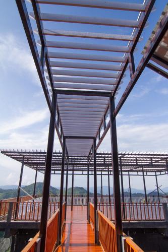 awning over a walkway on top of a building at My Place Mae Salong in Ban A Ku