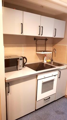 Η κουζίνα ή μικρή κουζίνα στο Residence B&B La Fontaine Aparthotel
