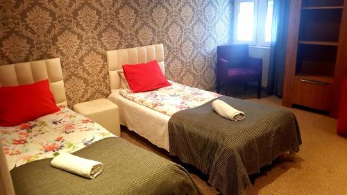 Ένα ή περισσότερα κρεβάτια σε δωμάτιο στο Residence B&B La Fontaine Aparthotel