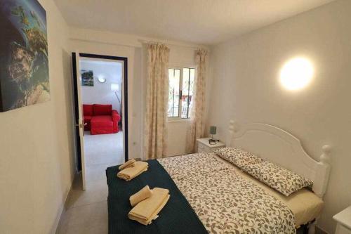 Posteľ alebo postele v izbe v ubytovaní Mare Verde B90 by Tenerife Rental and Sales