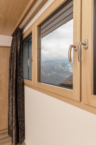 a window in a room with a view at Ferienwohnungen Tannenboden in Flumserberg