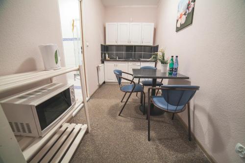 Η κουζίνα ή μικρή κουζίνα στο Residence B&B La Fontaine Aparthotel