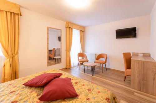 TV a/nebo společenská místnost v ubytování Hotel Torretta