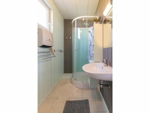 a bathroom with a glass shower and a sink at Gîte Touvois, 3 pièces, 4 personnes - FR-1-306-1040 in Touvois