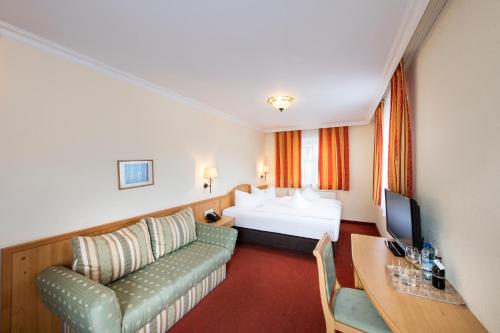 Hotel Elisabethにあるテレビまたはエンターテインメントセンター