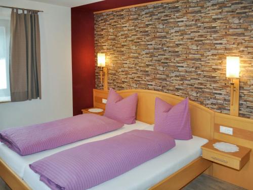 Posteľ alebo postele v izbe v ubytovaní Apartment Miramonte-2 by Interhome
