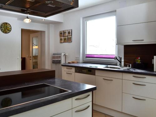 Η κουζίνα ή μικρή κουζίνα στο Holiday Home Viola by Interhome