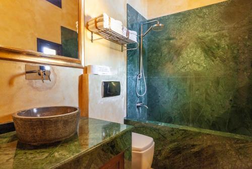 a bathroom with a sink and a shower at Spirit Of The Knights Boutique Hotel in Rhodes Town