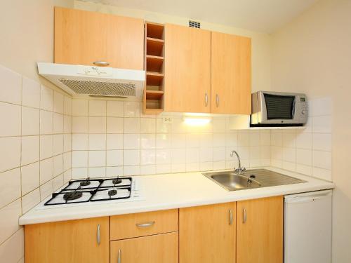 A cozinha ou cozinha compacta de Apartment Airial by Interhome