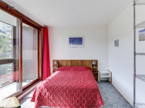 En eller flere senge i et værelse på Apartment Pegase Phenix-15 by Interhome