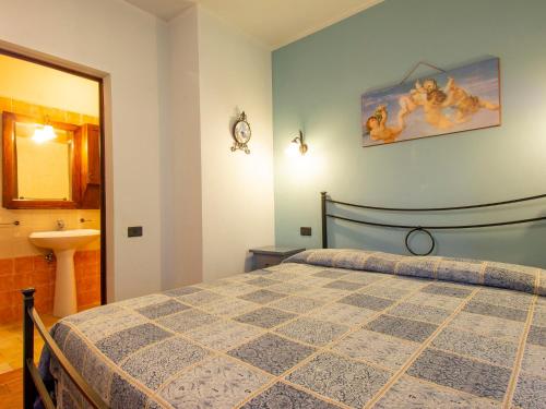 Katil atau katil-katil dalam bilik di Holiday Home Casa dei Ciliegi by Interhome