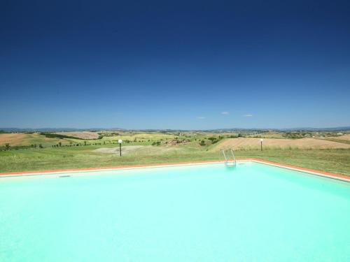 a large swimming pool with a view of the desert at Apartment B2 by Interhome in Casetta