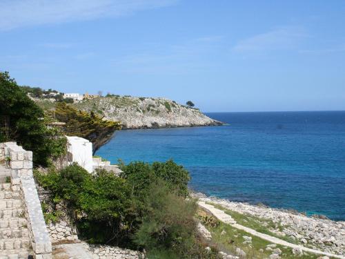 a view of the ocean from a rocky shoreline at Apartment Ada by Interhome in Castro di Lecce