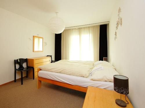 Giường trong phòng chung tại Apartment Allod-Park-7 by Interhome