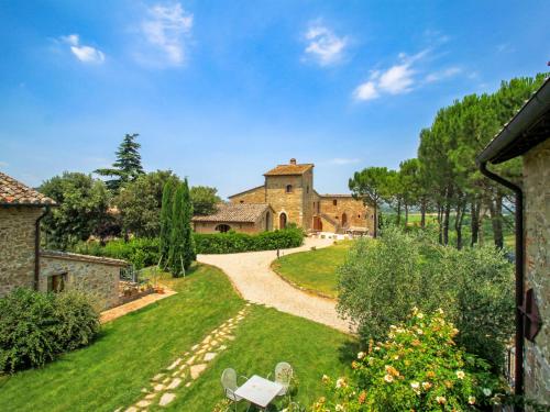 an external view of a house with a garden at Villa Borgo Monticelli-2 by Interhome in Castiglione della Valle
