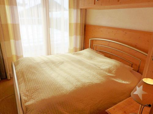 Ένα ή περισσότερα κρεβάτια σε δωμάτιο στο Apartment Antares R05 by Interhome
