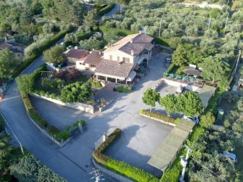 an aerial view of a house with a large driveway at Holiday Home Trasimeno link by Interhome in San Savino