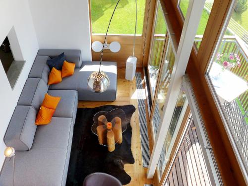 an overhead view of a living room with a couch at Apartment Chesa Vadret 12 by Interhome in Pontresina